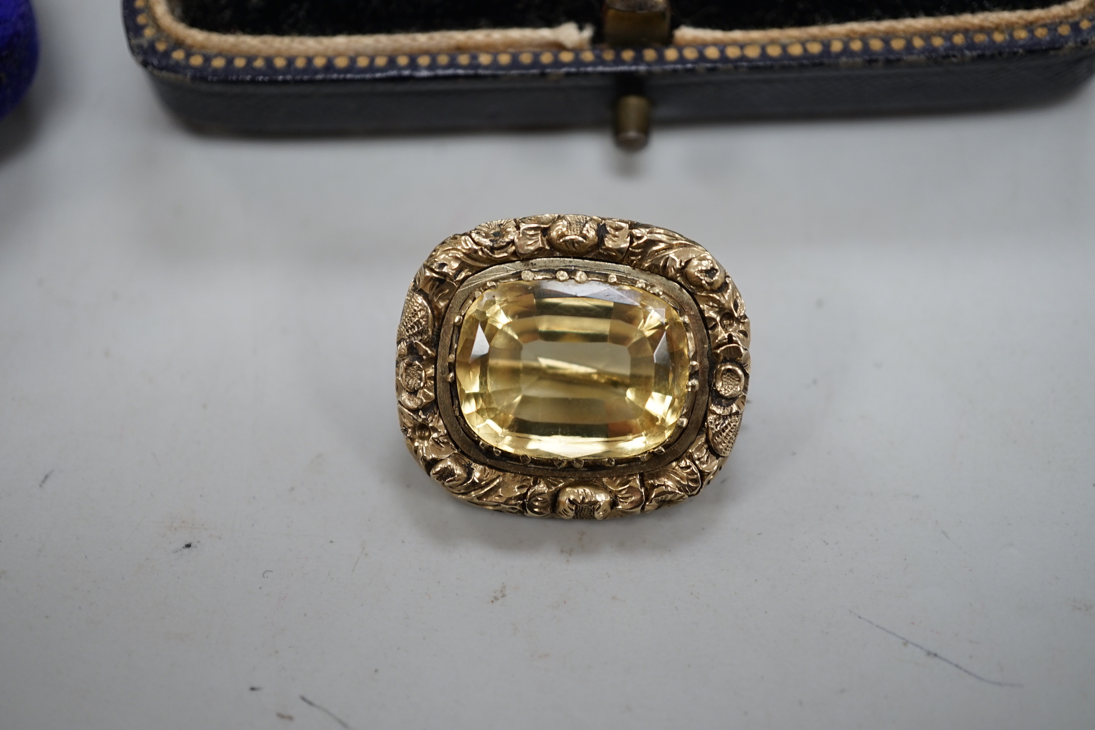 An Edwardian 15ct gold and seed peal set heart drop bar brooch, 40mm, gross weight 2.7 grams, two other yellow metal and gem set bar brooches and a Victorian citrine set brooch.